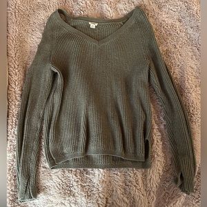 olive green sweater with detail on the side of the arm (size small)